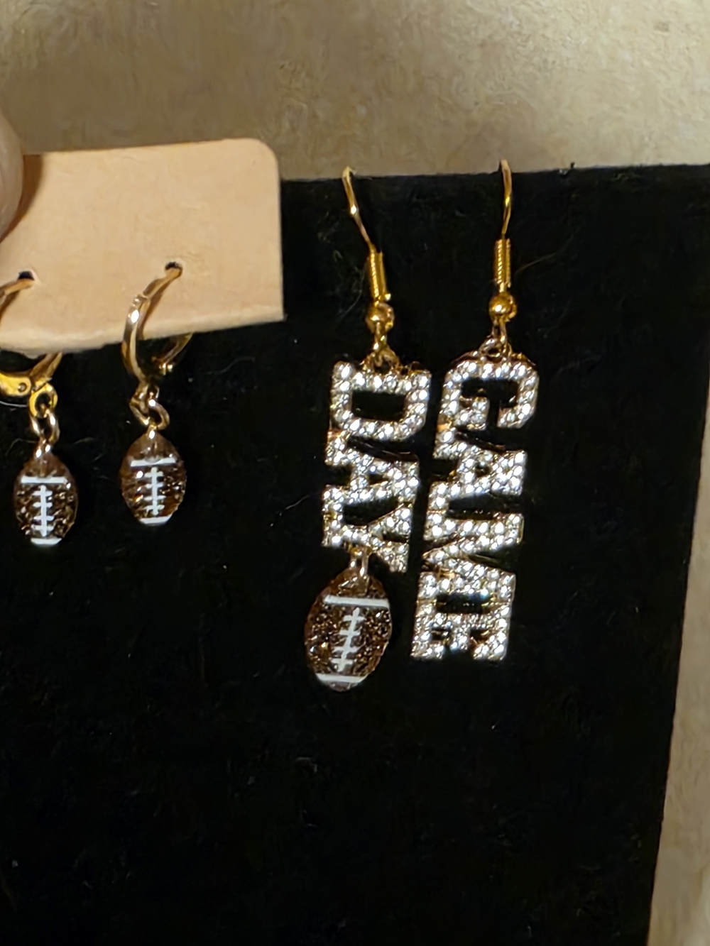 Gold Tone 'Game Day' Rhinestone Drop Earrings with Brown Football Charm